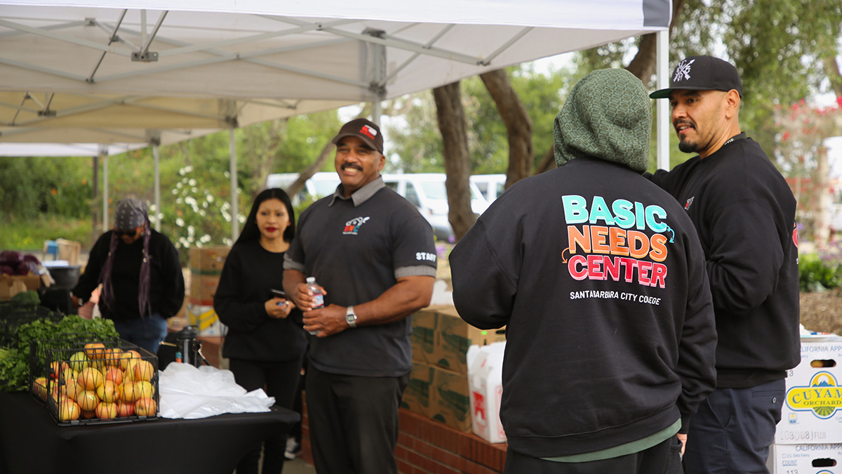 Basic Needs Center team wearing sweatshirts during food share event